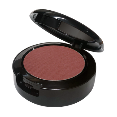 Compact blush in a black case on a white background