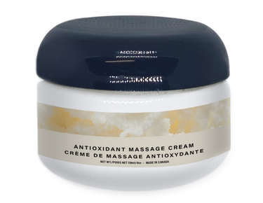 Jar of antioxidant massage cream with a dark blue lid on a white background